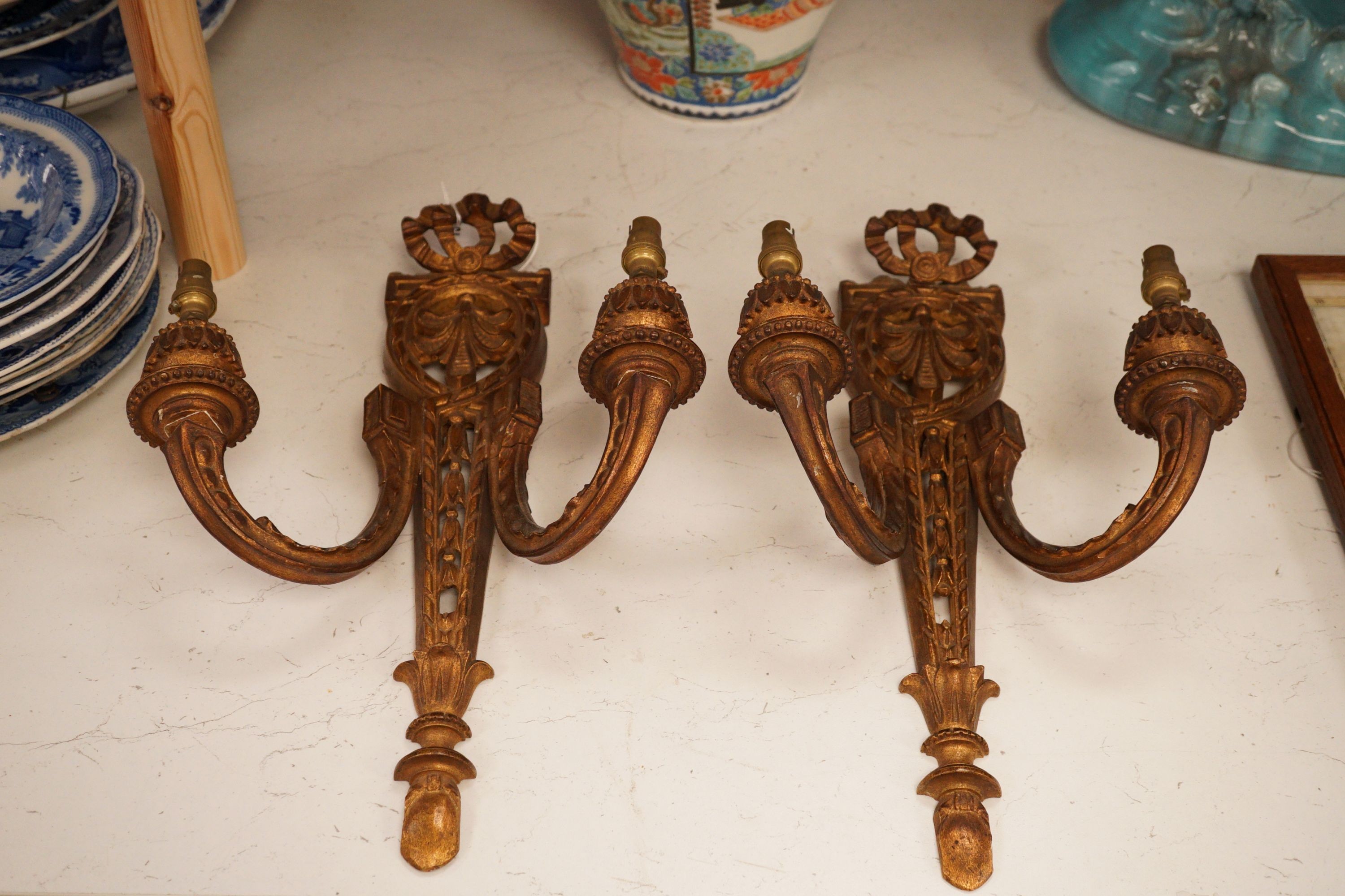 A pair of neoclassical style giltwood wall lights 45cm